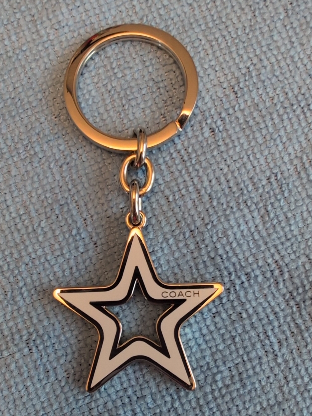 Coach White and Gold Star Keychain